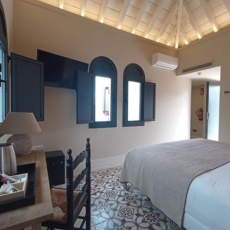 Uma Suites Parada Del Marques Sevilla Bagian luar foto