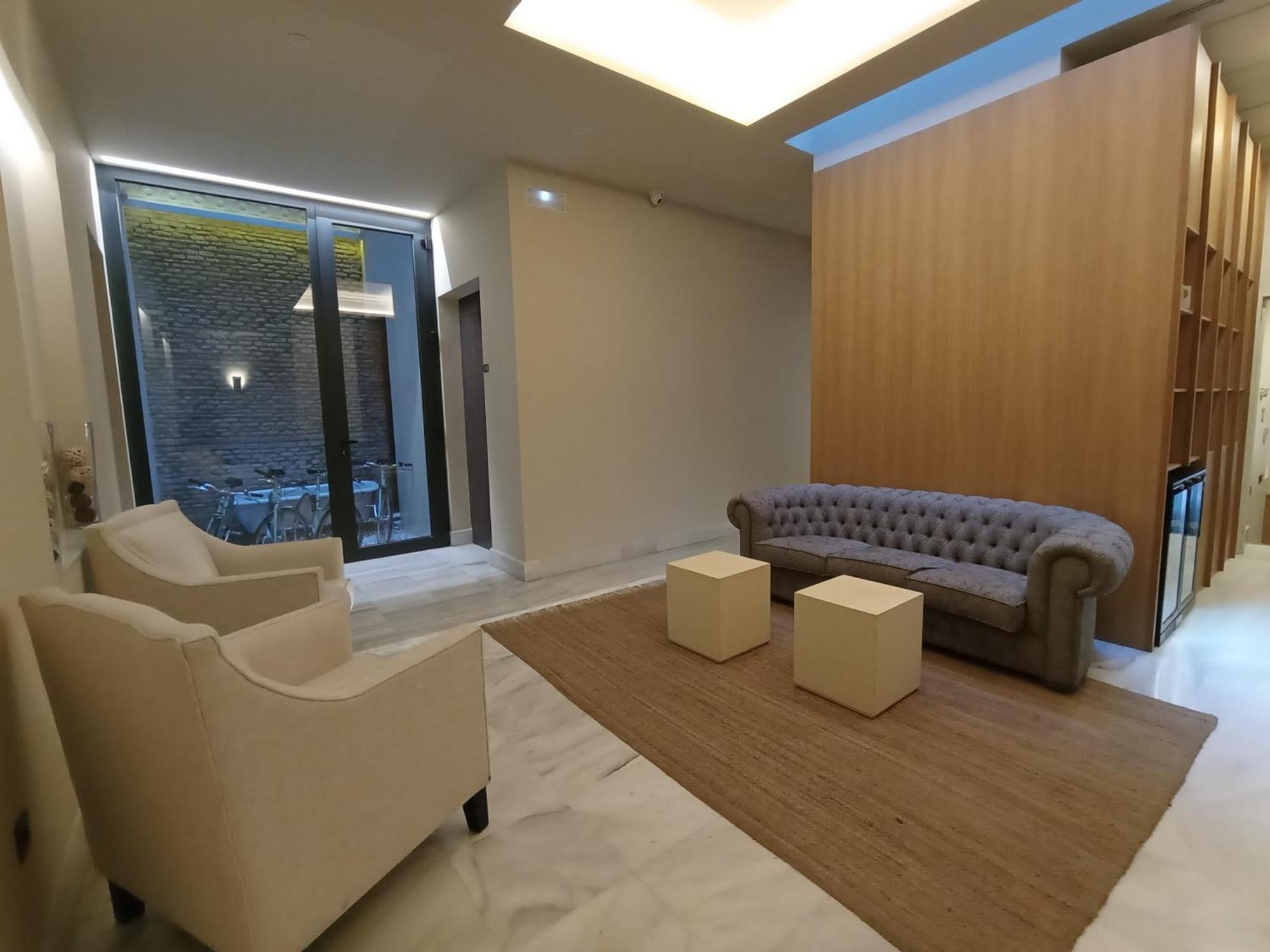 Uma Suites Parada Del Marques Sevilla Bagian luar foto