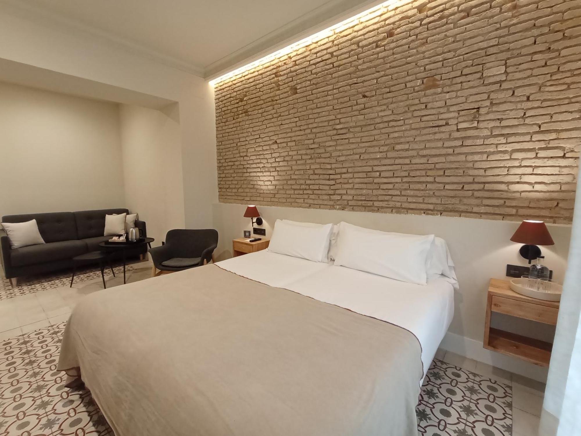 Uma Suites Parada Del Marques Sevilla Bagian luar foto