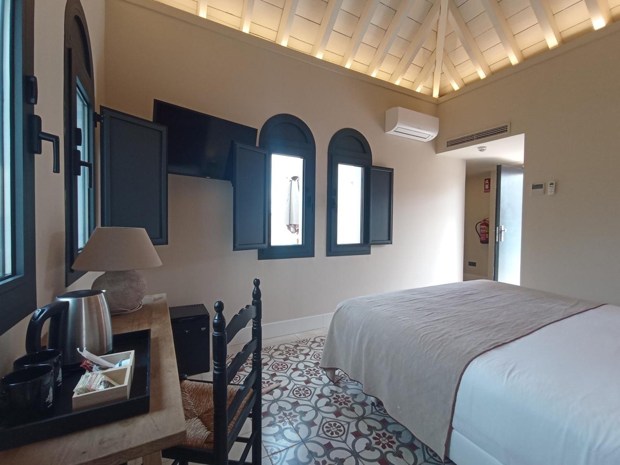 Uma Suites Parada Del Marques Sevilla Bagian luar foto