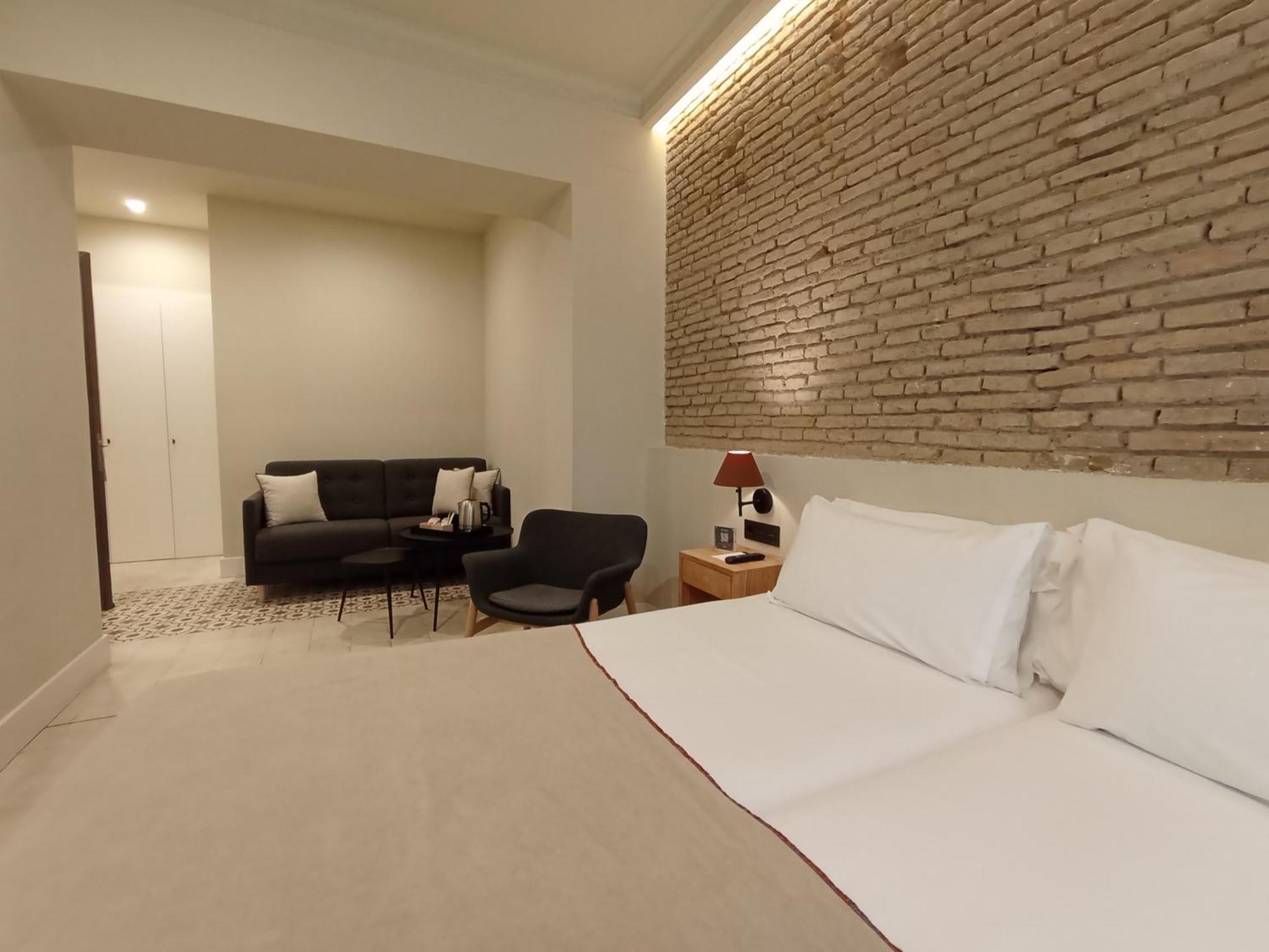 Uma Suites Parada Del Marques Sevilla Bagian luar foto