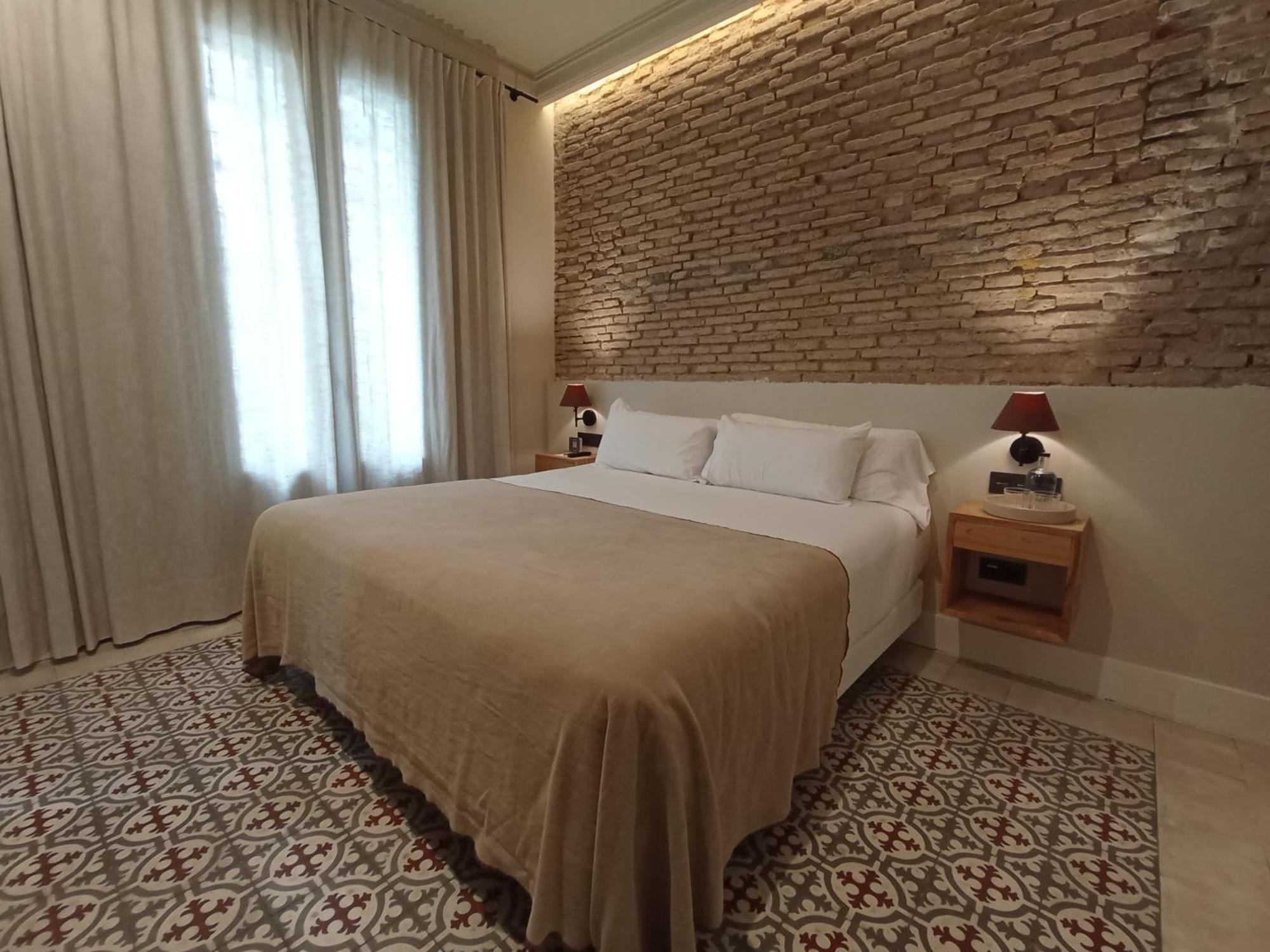 Uma Suites Parada Del Marques Sevilla Bagian luar foto