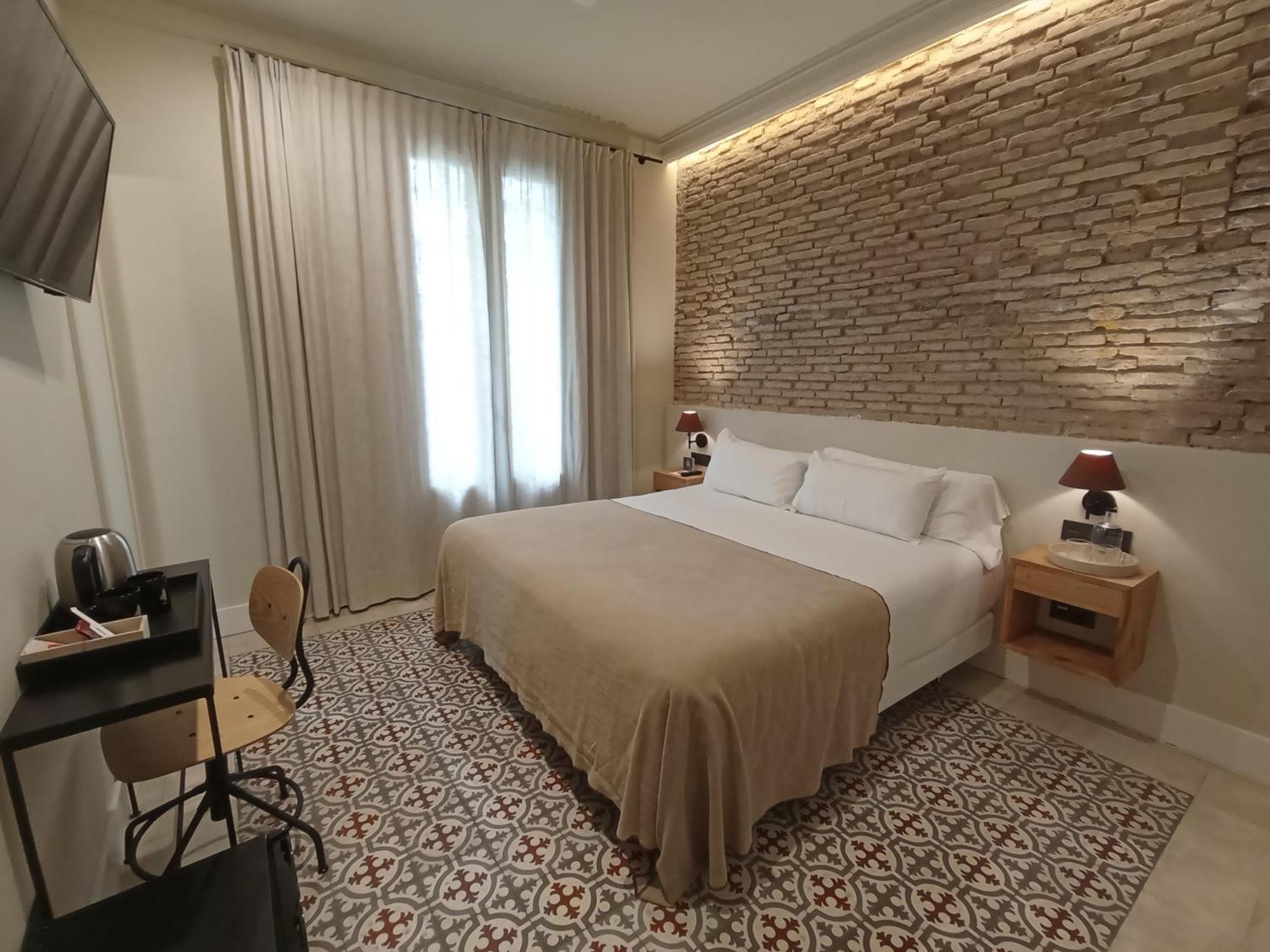 Uma Suites Parada Del Marques Sevilla Bagian luar foto