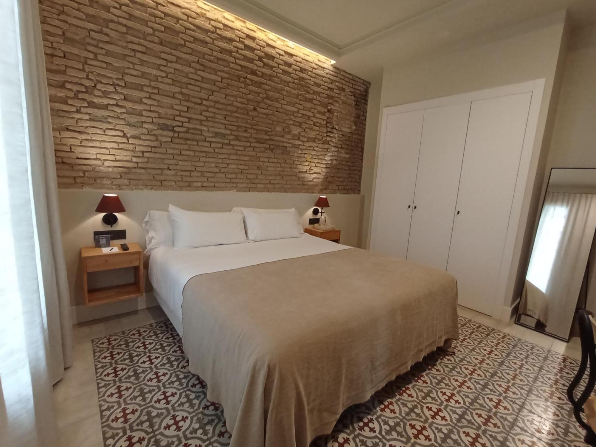 Uma Suites Parada Del Marques Sevilla Bagian luar foto