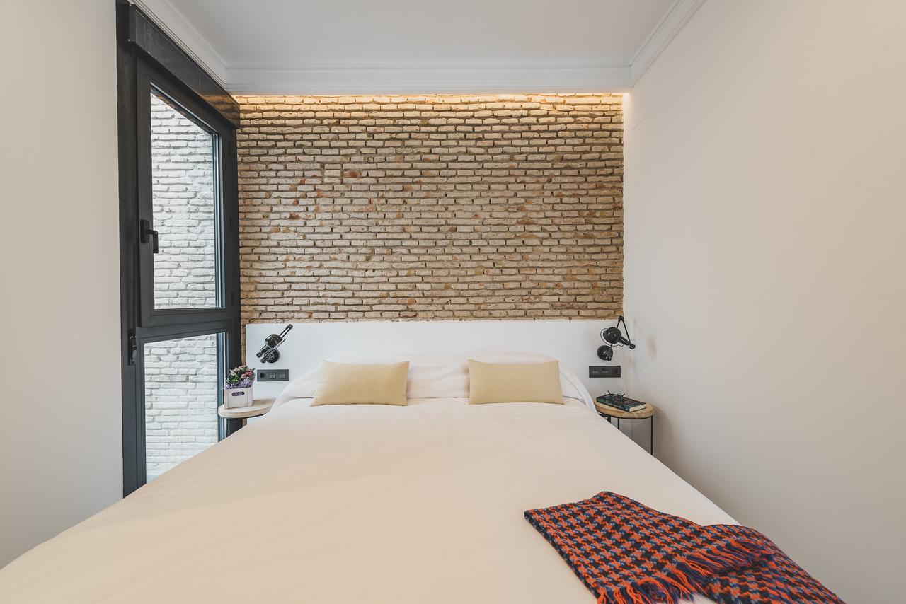 Uma Suites Parada Del Marques Sevilla Bagian luar foto