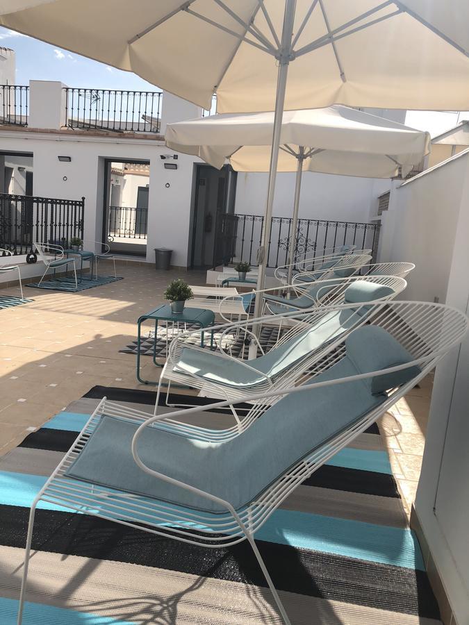 Uma Suites Parada Del Marques Sevilla Bagian luar foto