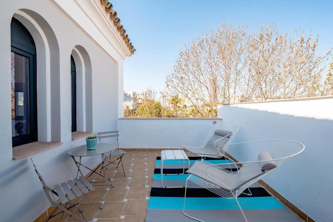 Uma Suites Parada Del Marques Sevilla Bagian luar foto